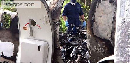 巴西农民洗劫坠毁的银行包机劫走260万美元(图)